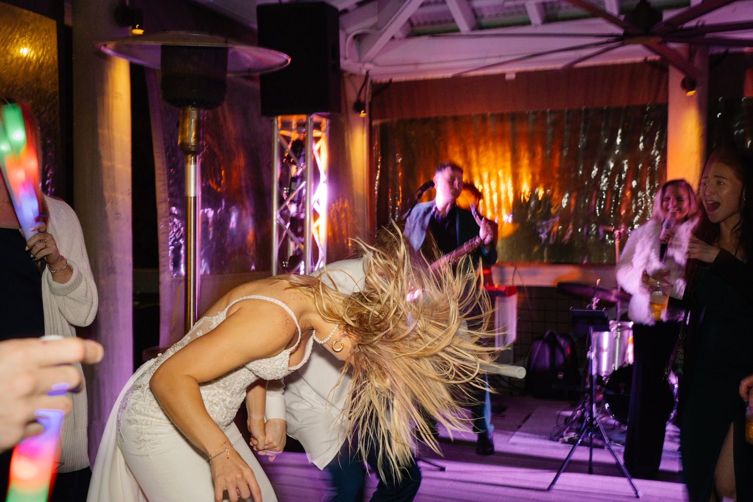 A collage of party scenes with purple lighting showing people dancing and celebrating in a venue.