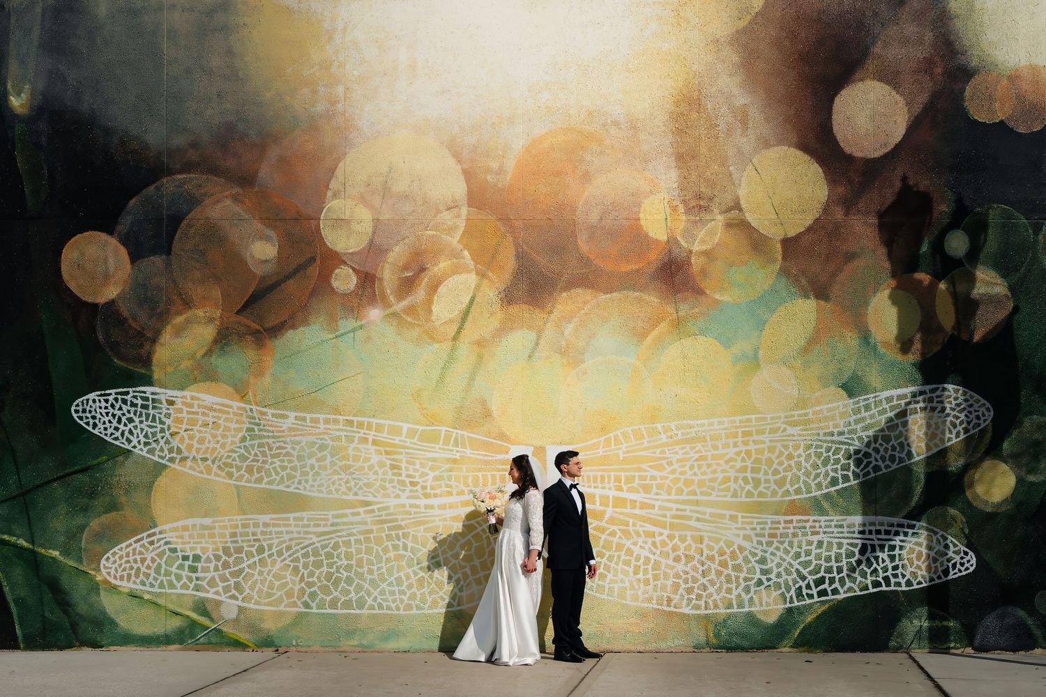 Elegant wedding reception hall with sparkling bokeh lights and decorative elements creating a romantic atmosphere.