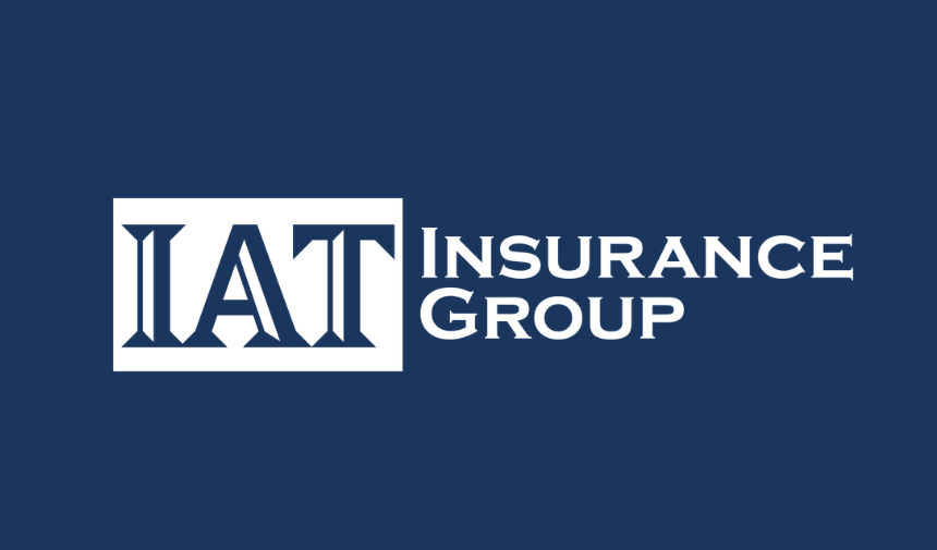 IAT Insurance Group logo displayed in white text on a navy blue background.