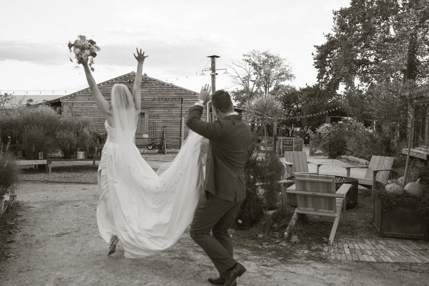 A flowing white wedding dress billows in the wind as it is held up in various outdoor settings.