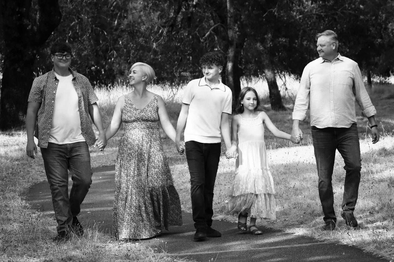 Family walking together holding hands
black and white photos