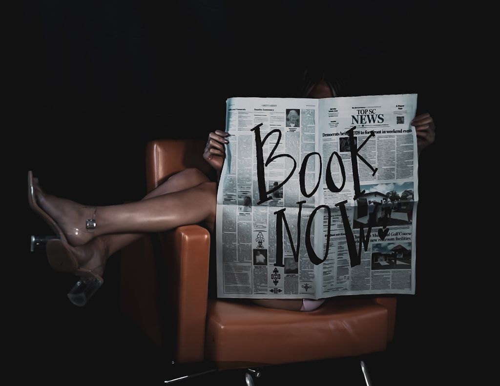 A series of black and white artistic photographs showing legs, feet, and newspapers in various compositions.