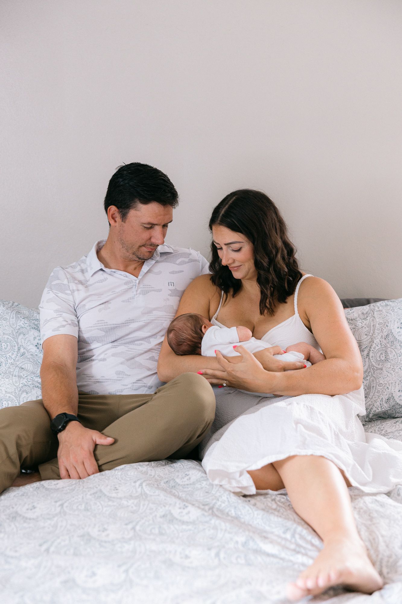 picture of couple holding newborn baby