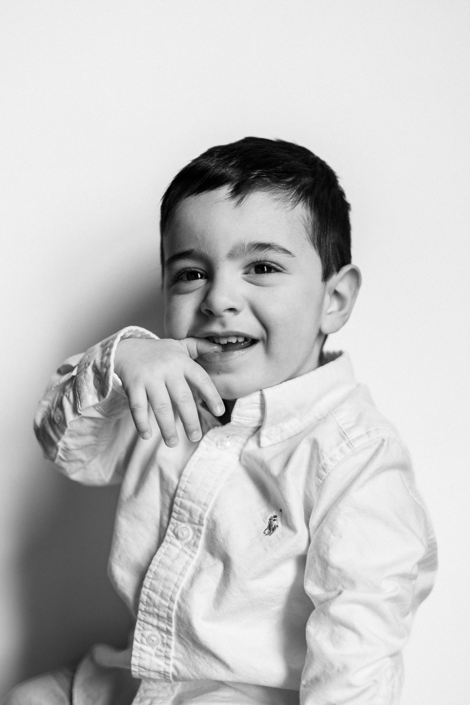 black and white toddler photo smiling