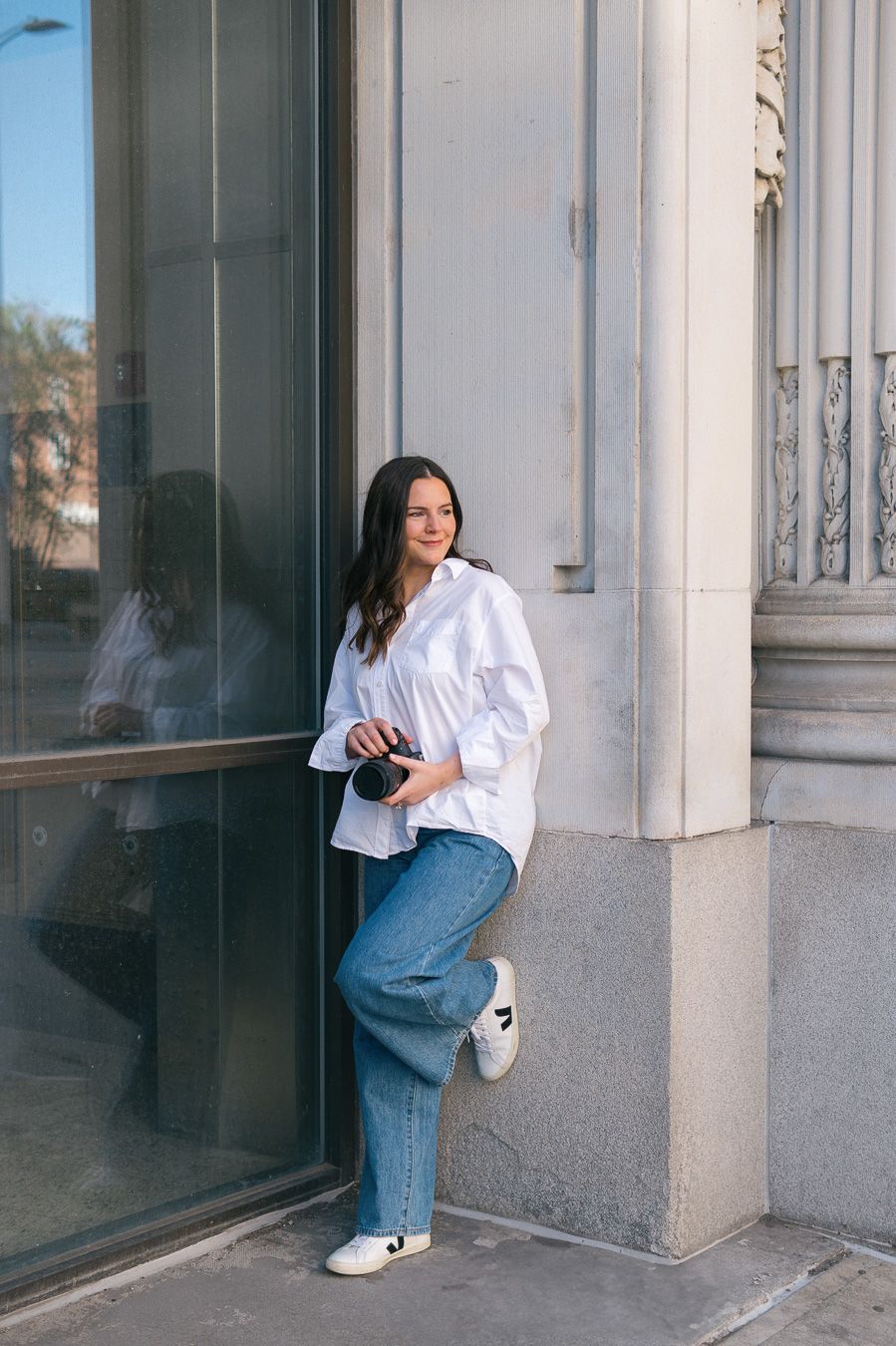 A sequence of photos shows someone in jeans and white shirt looking through windows and peering around corners.