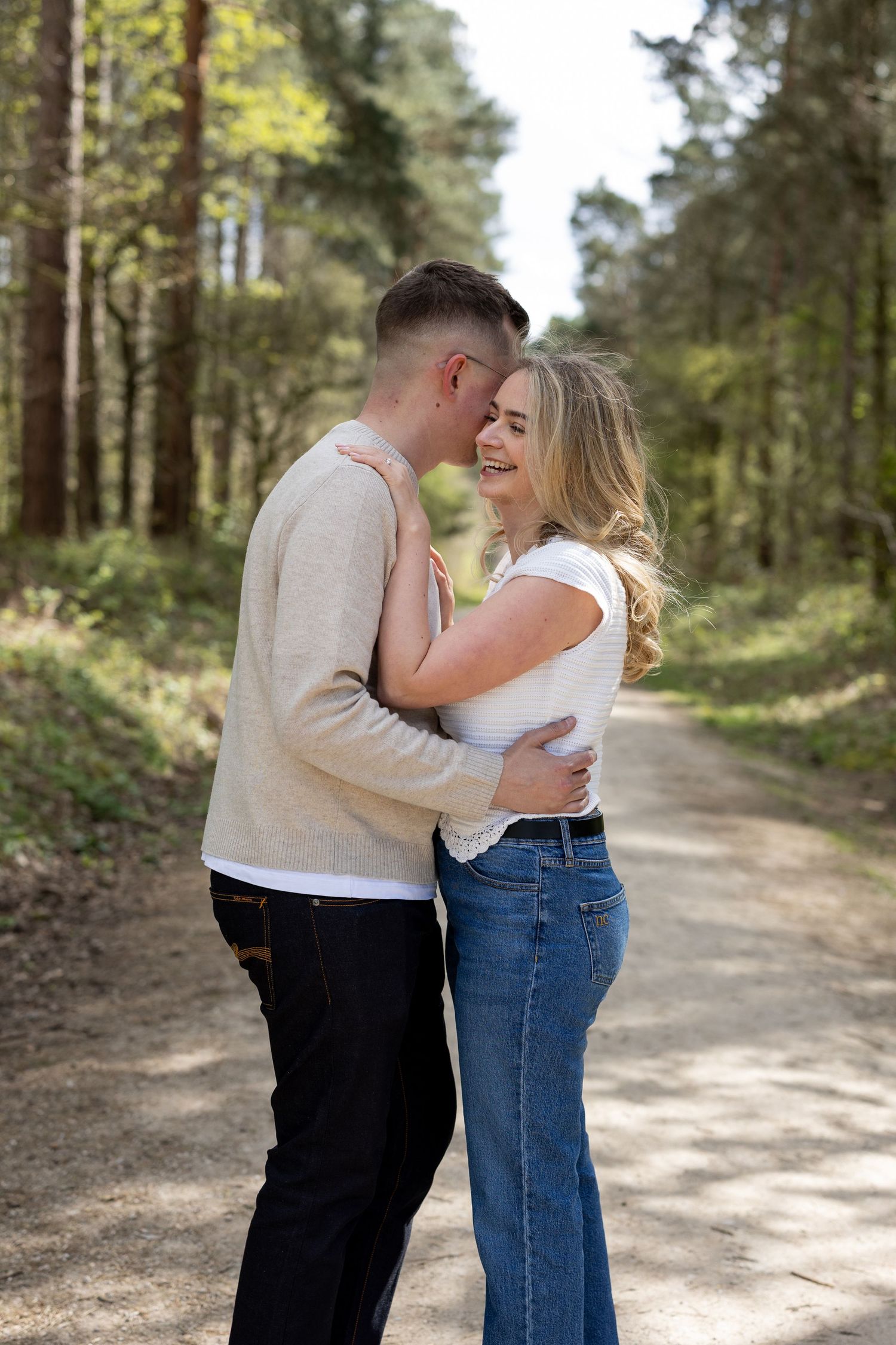 Laughter and natural lighting in the woods. Couples engagement shoot, Nottingham. The Midlands.