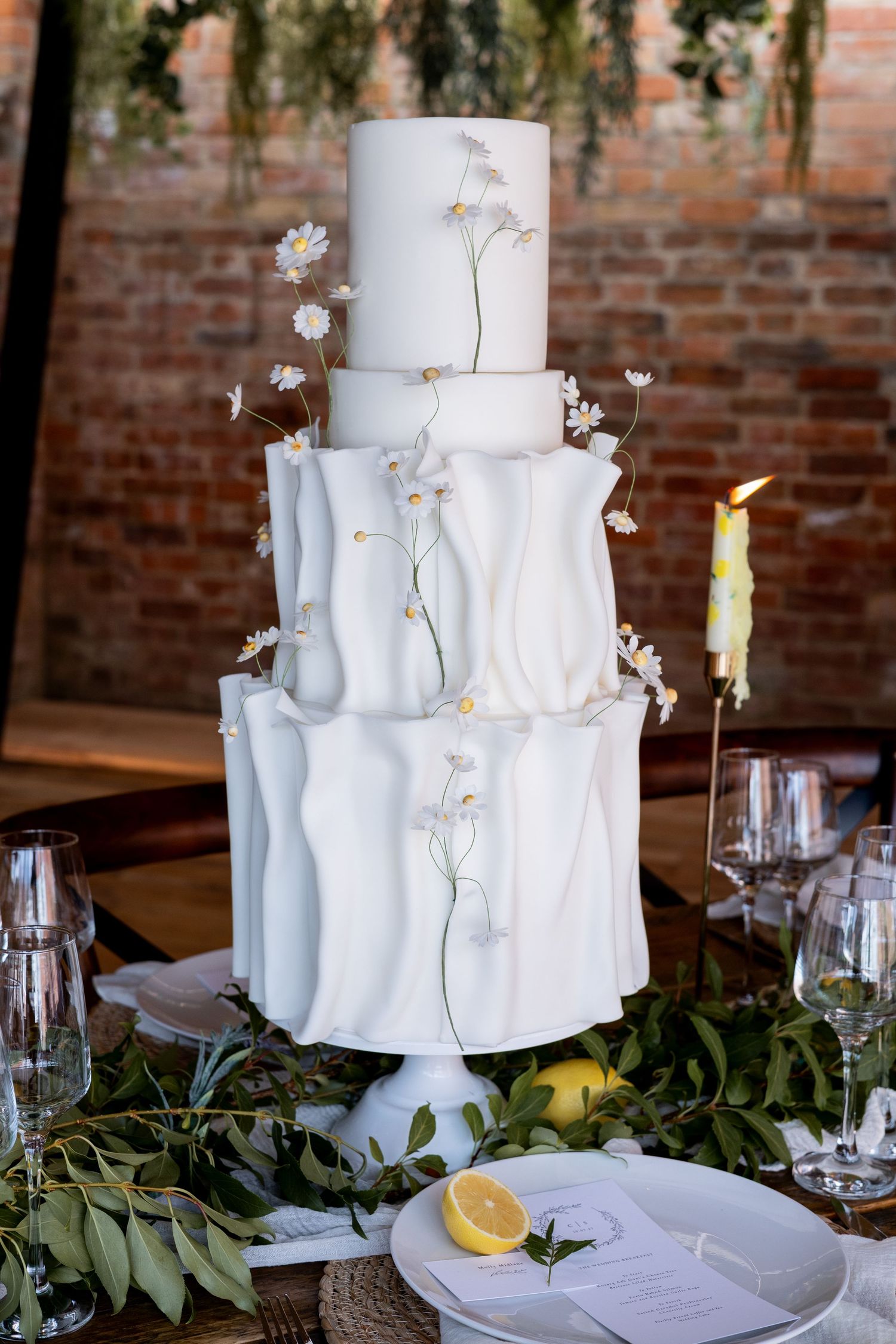 A gorgeous three tiered cake captured at The Fable Yard in the Midlands.