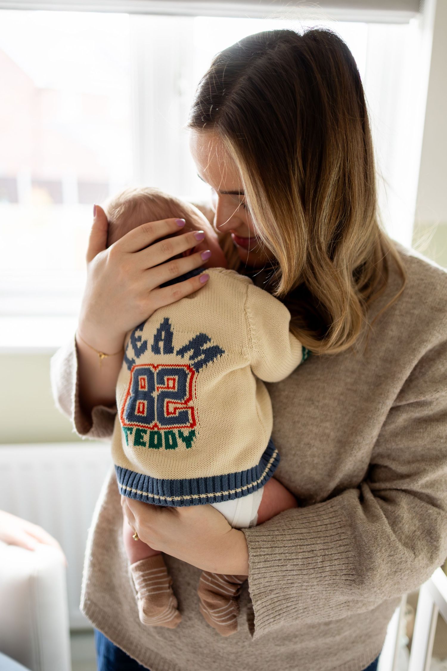 A newborn shoot at the family home. Mum and son. Chesterfield, midlands.
