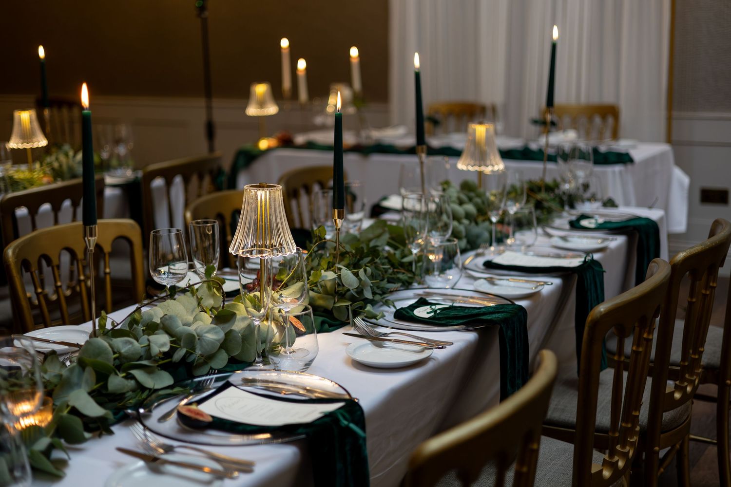 Stunning long tables with foliage, candles and lamps at The Cockliffe Country House, Nottingham