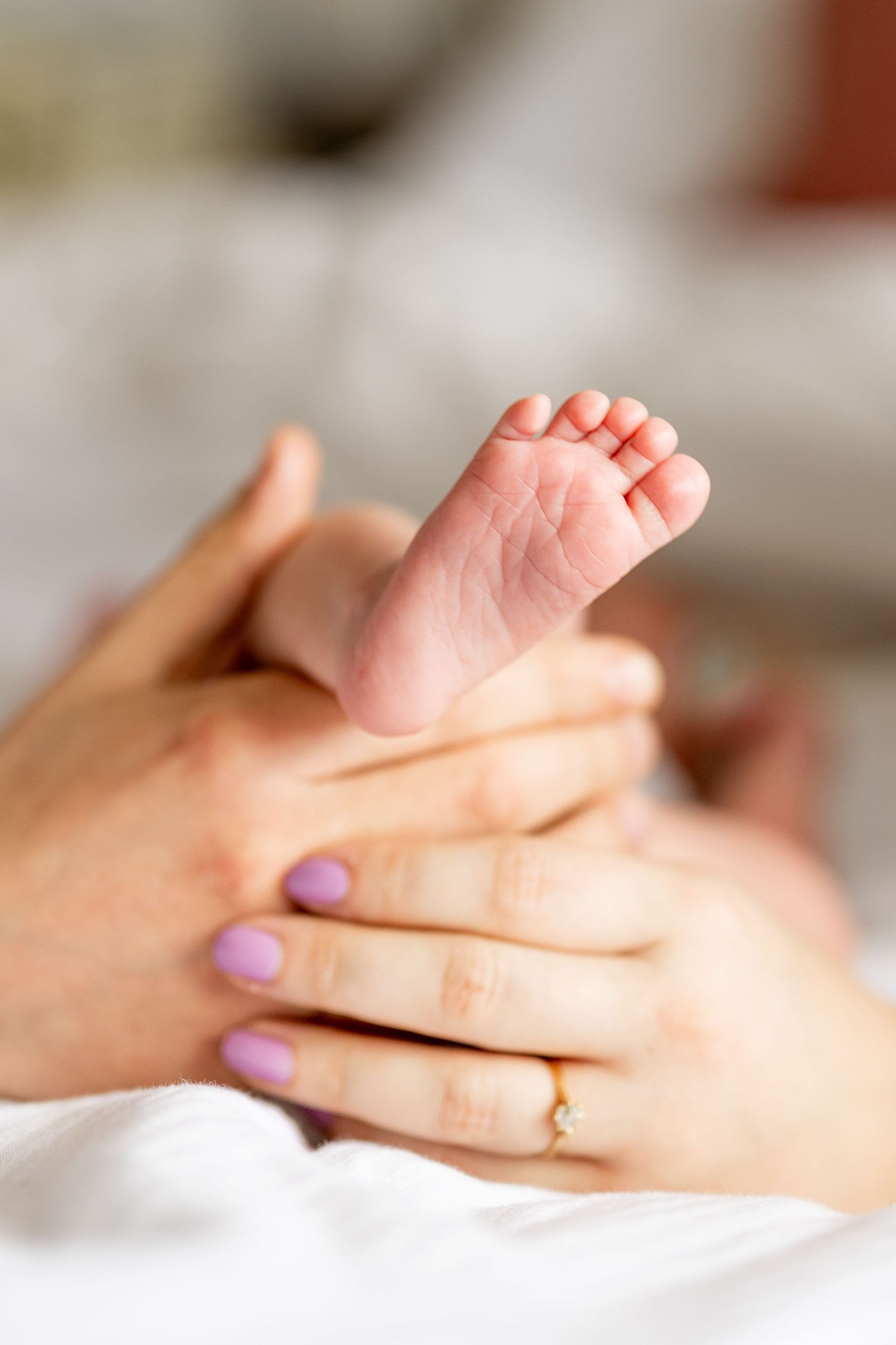 A newborn shoot at the family home. Tiny toes. Chesterfield, midlands.