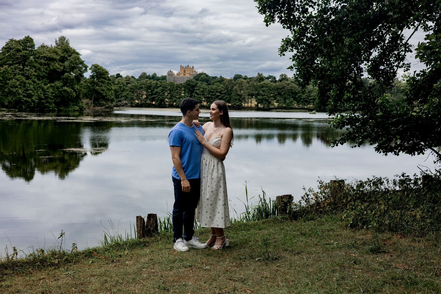 Engagement shoot outside Wollaton Hall, Nottingham. Beautiful lake and landscape.