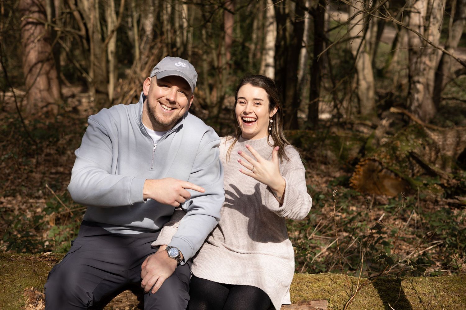 A couple during golden hour on their engagement shoot. Beautiful setting. Natural, documentary photography. Nottingham, Midlands.