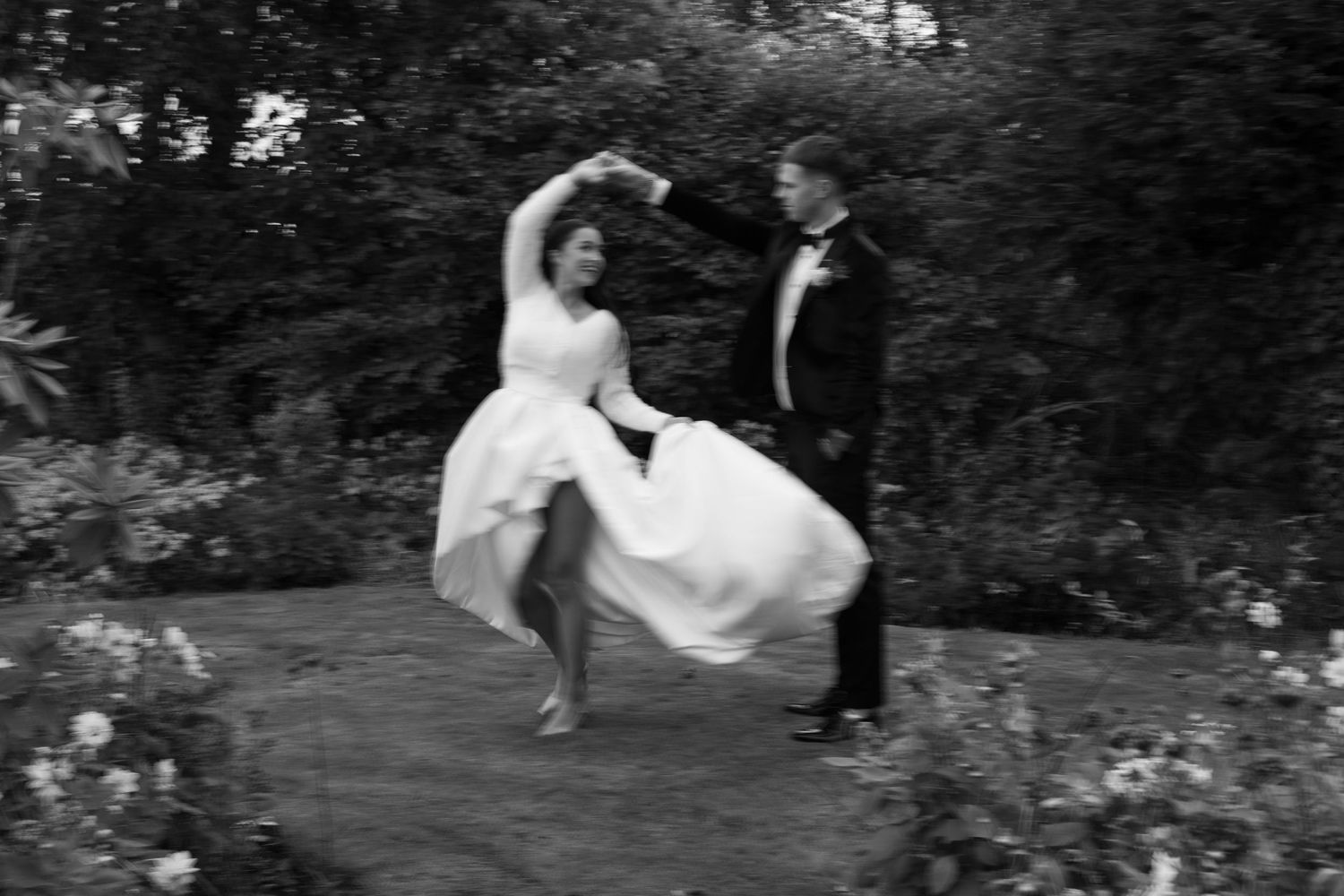 Bride and groom dancing in the beautiful gardens at The Cockliffe Country House, Nottingham.