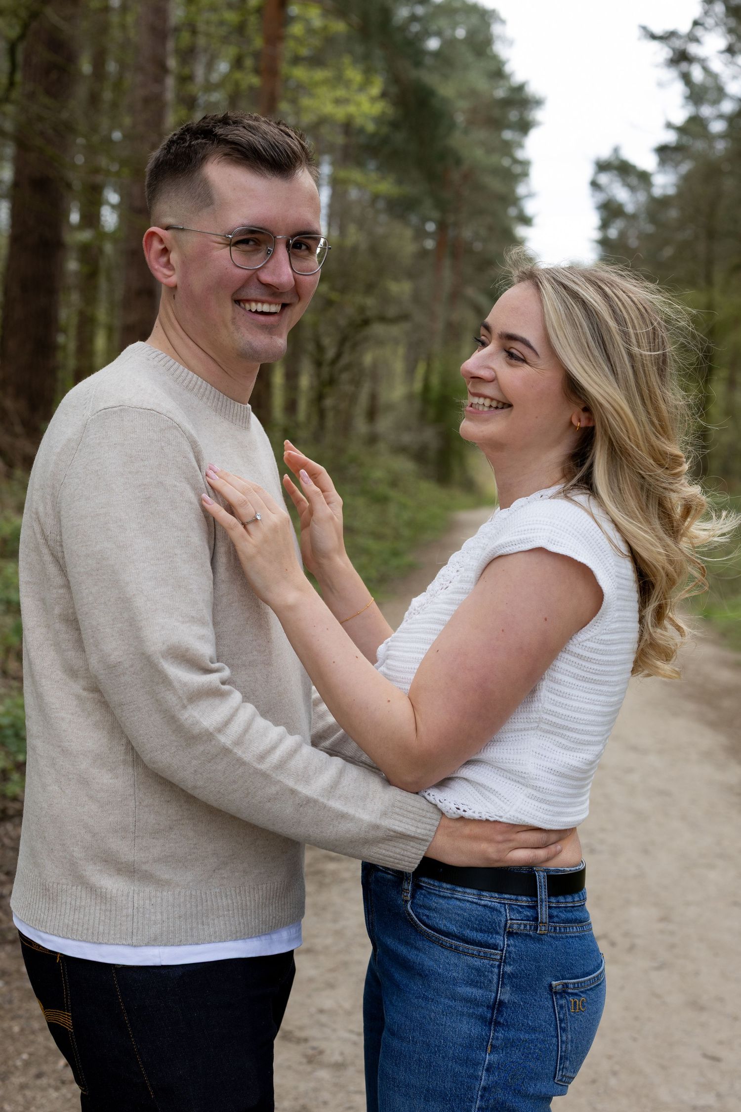 Laughter and natural lighting in the woods. Couples engagement shoot, Nottingham. The Midlands.