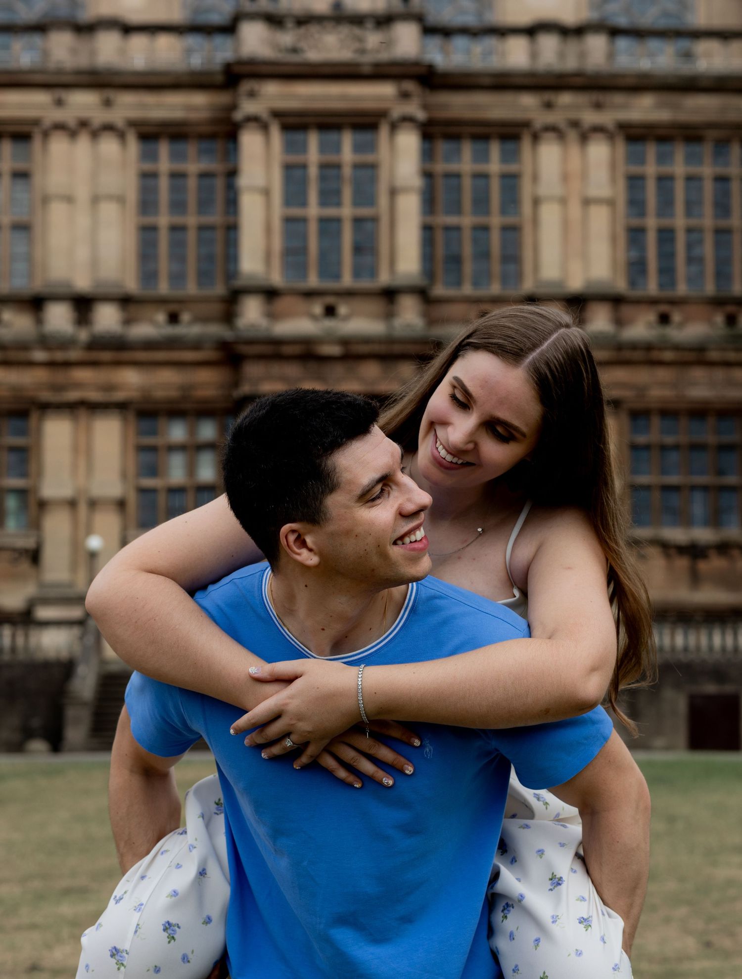 Piggy back! Couple looking at each other and smiling during a piggy back. Natural documentary wedding photography