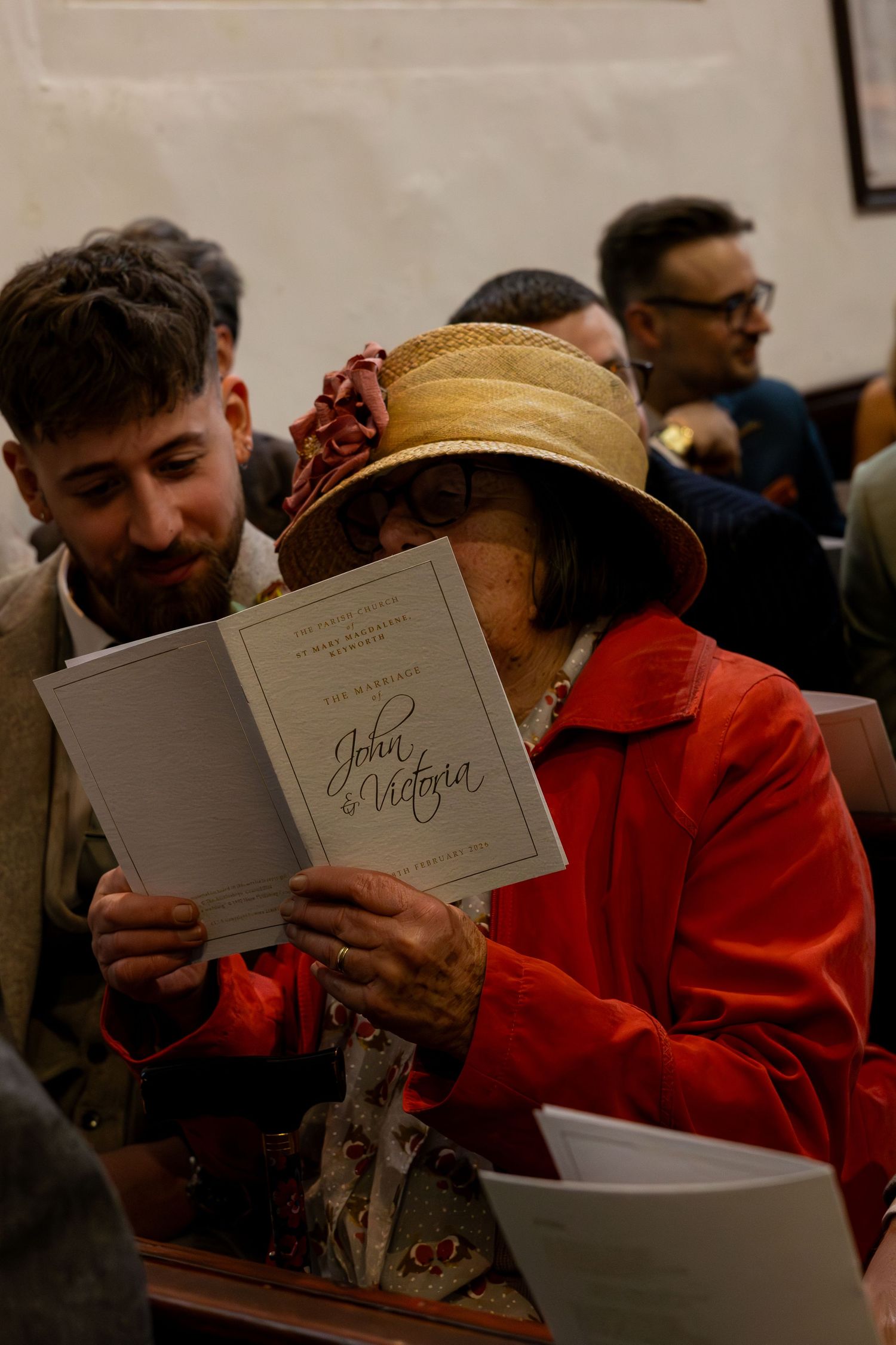 The Grandmother of the bride reading through the order of service for a wedding in Nottingham