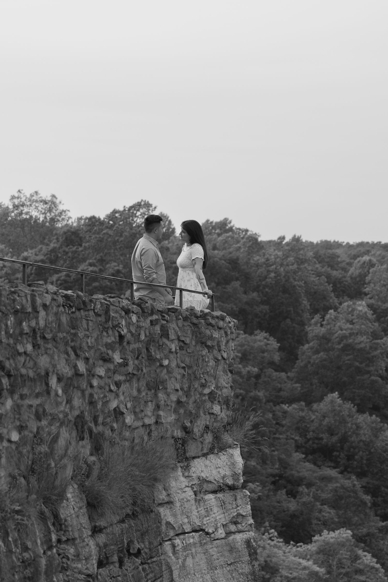 Lifestyle engagement portraits with Rock City overlook at Lookout Mountain
