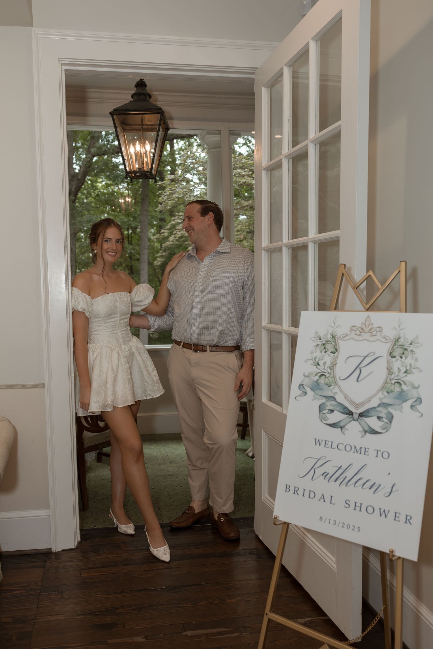 Crystal chandeliers and soft pastel decor at Swan Coach House event