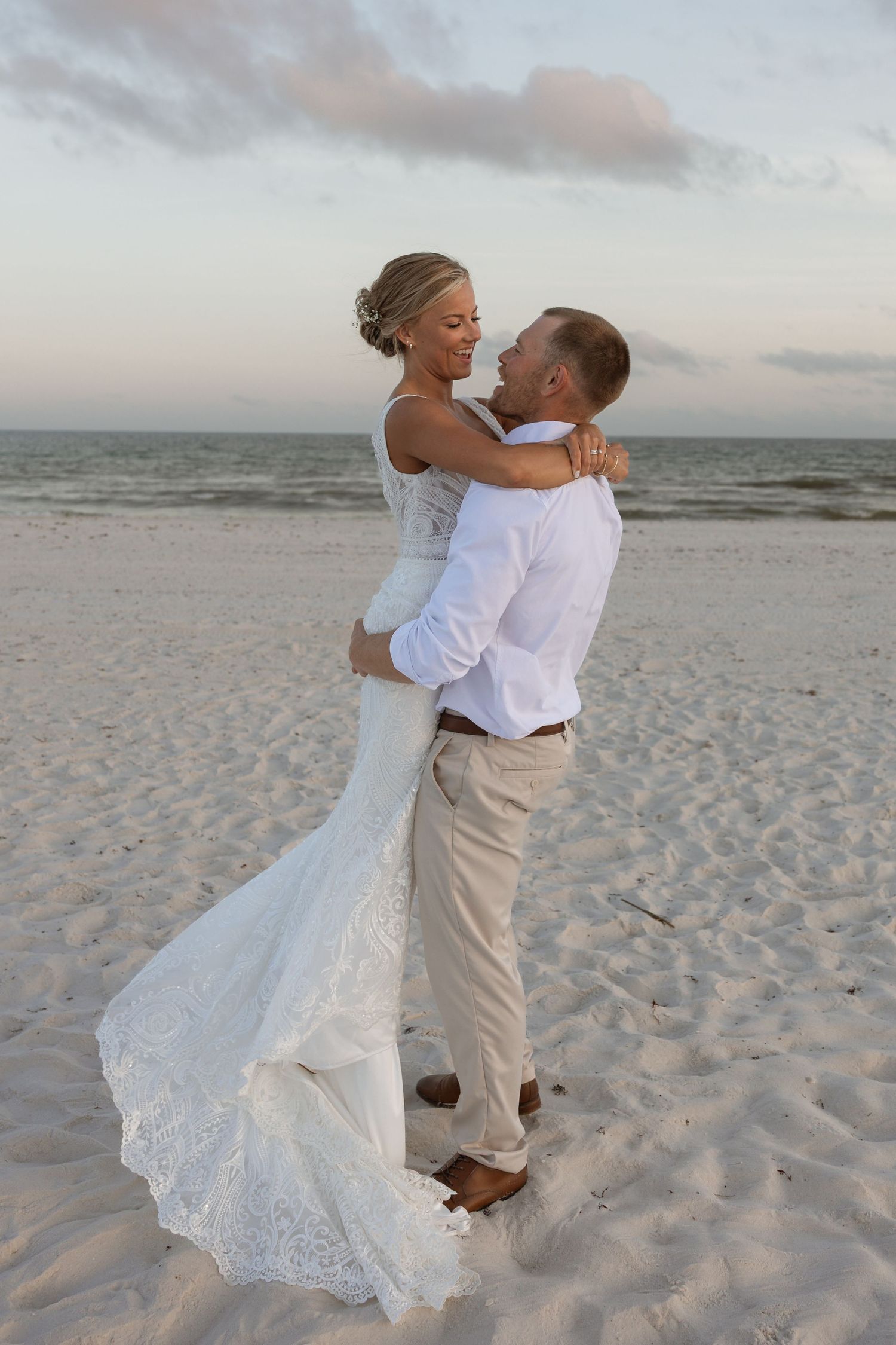 Intimate couple portraits on the sand during Navarre Beach micro wedding