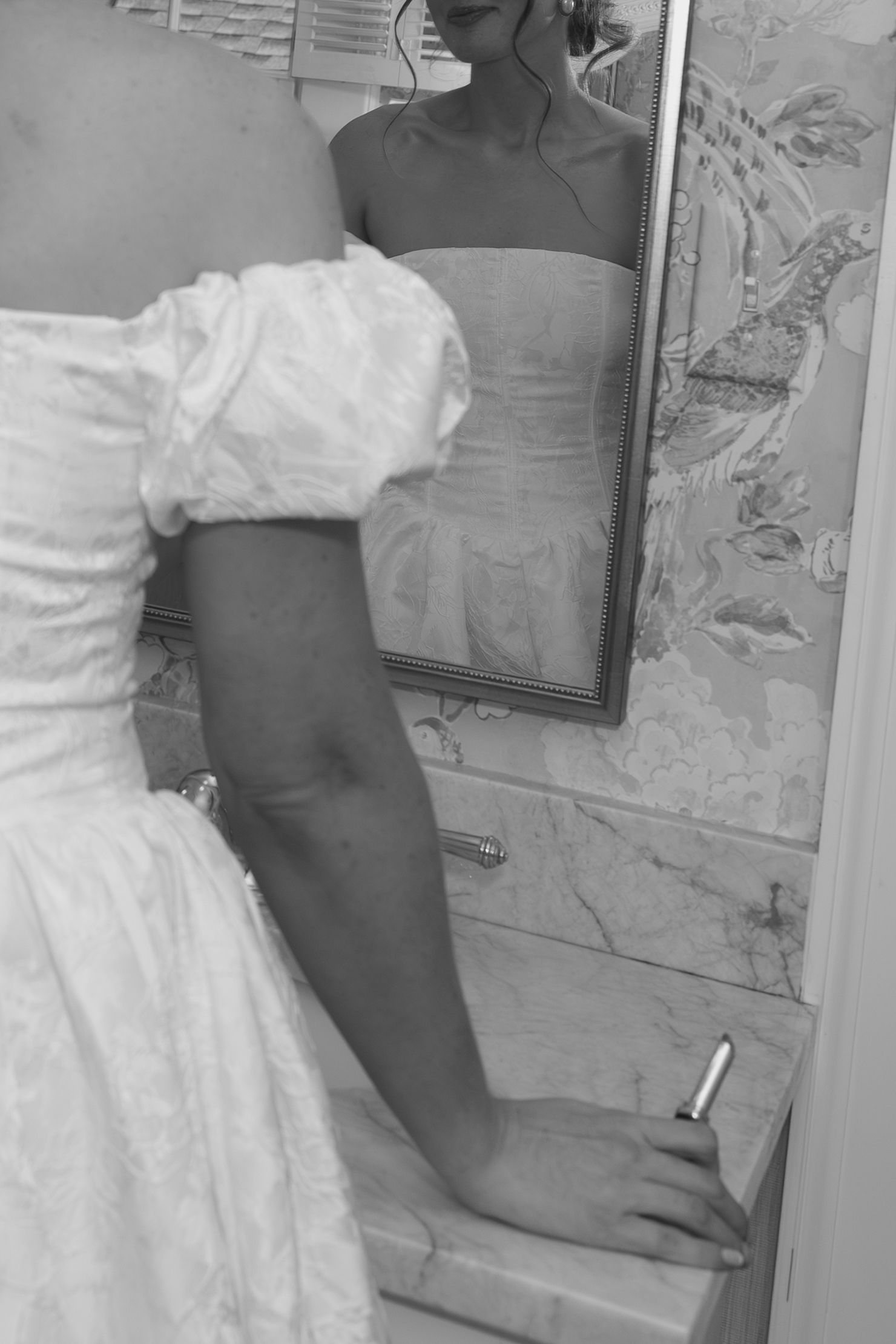 Documentary moment of bride during bridal shower at Swan Coach House
