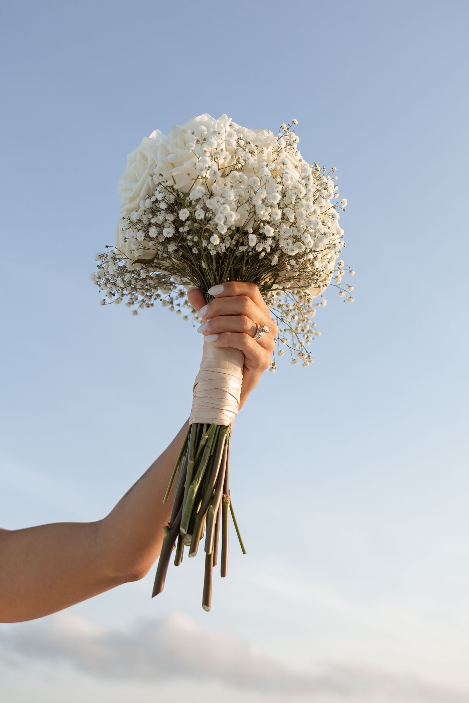 Decor elements and beach wedding signage at laid-back Navarre Beach FL wedding