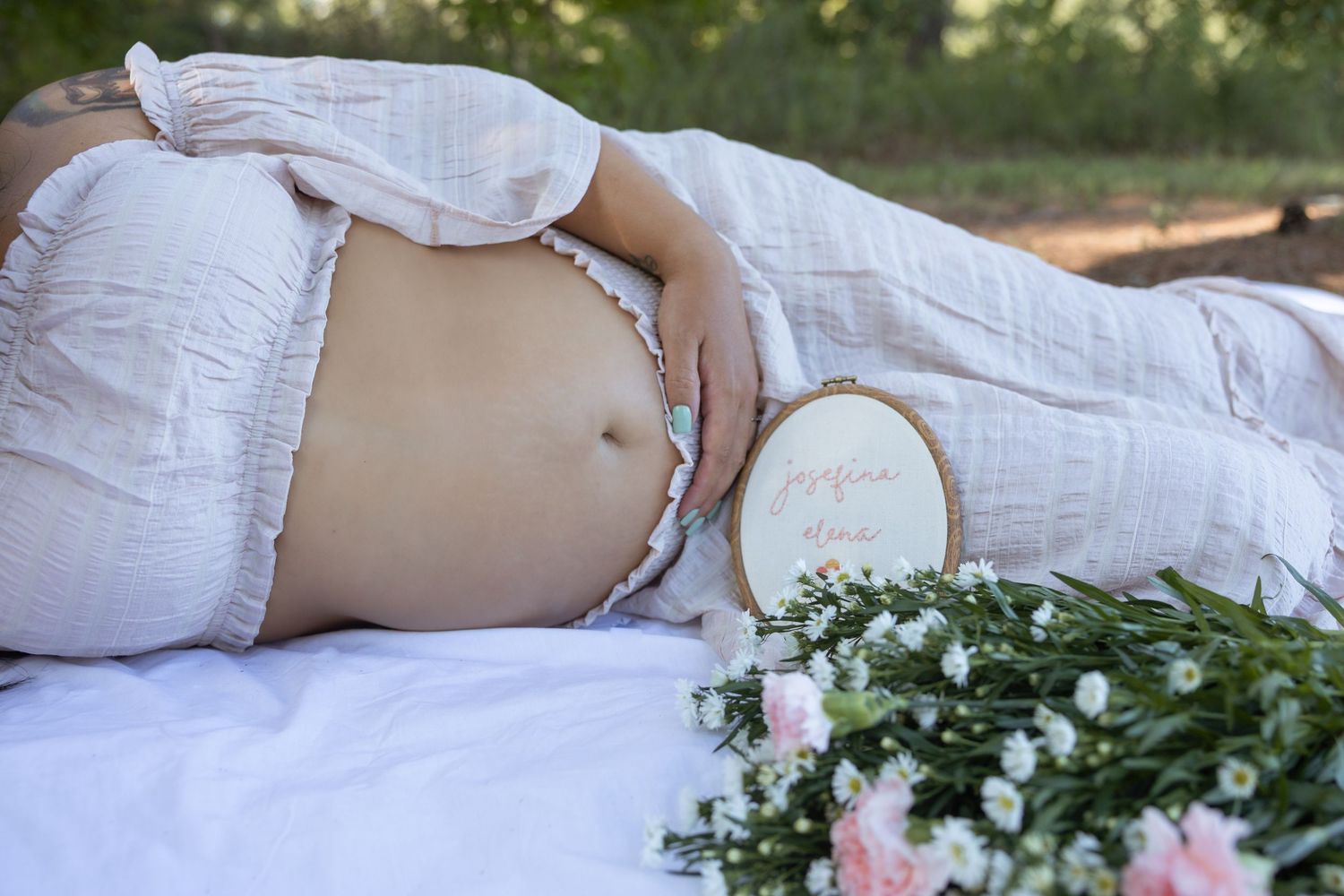 Atlanta maternity photography capturing an expecting mother in soft natural light, photographed in a warm, documentary style with timeless,