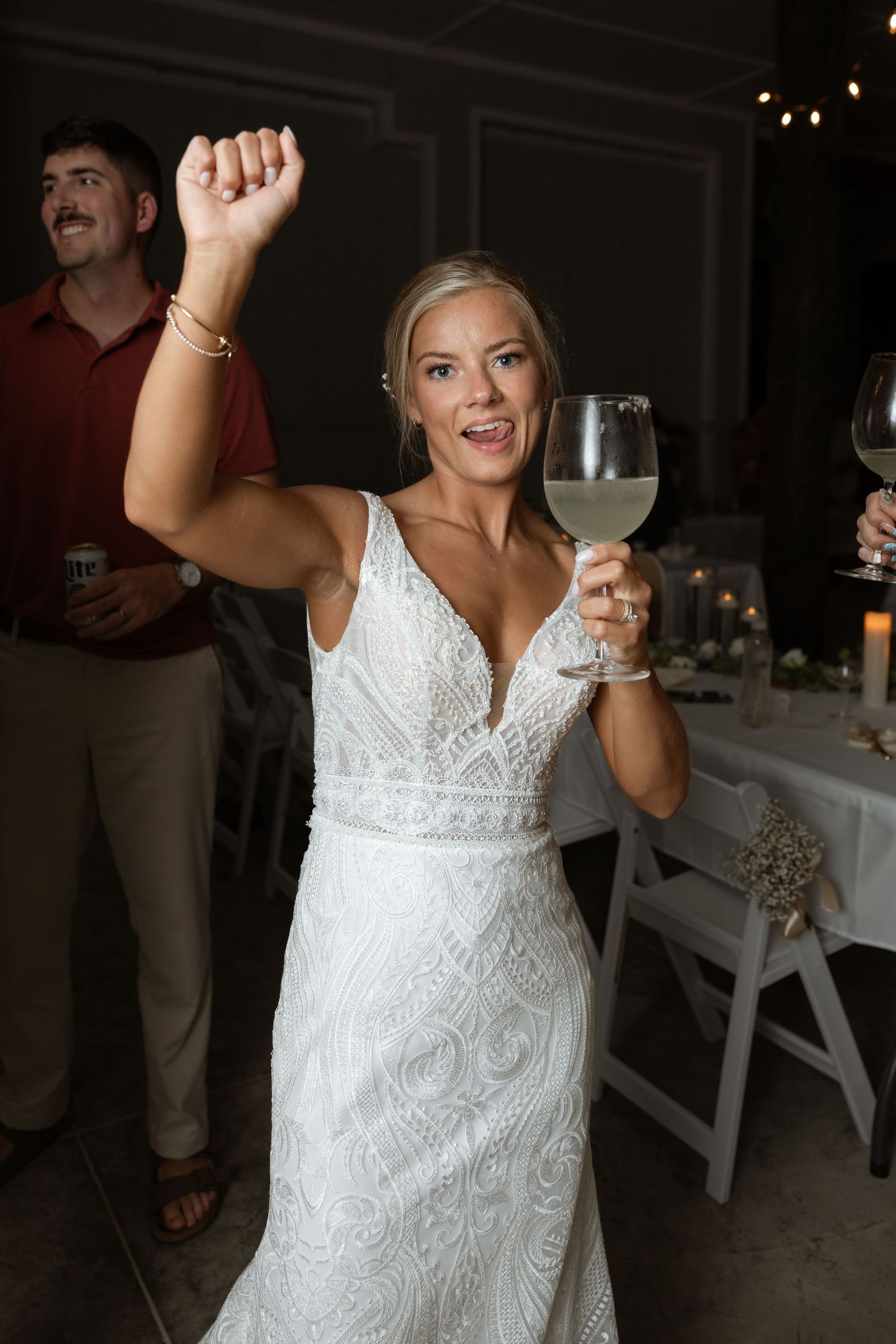 Bride wearing detailed wedding dress near the beach at Navarre Beach FL