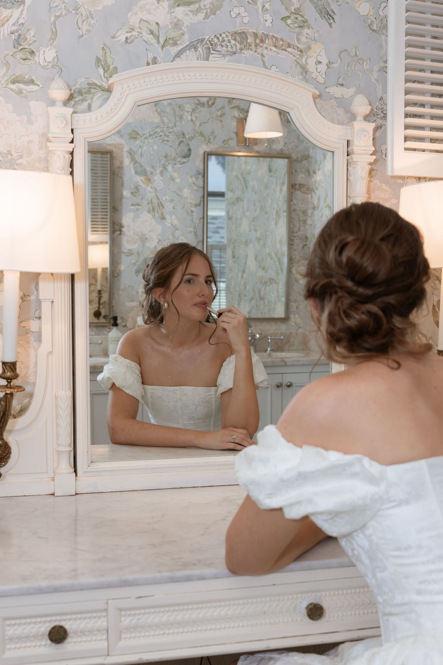 Bride getting ready at Swan Coach House bridal shower in Atlanta GA