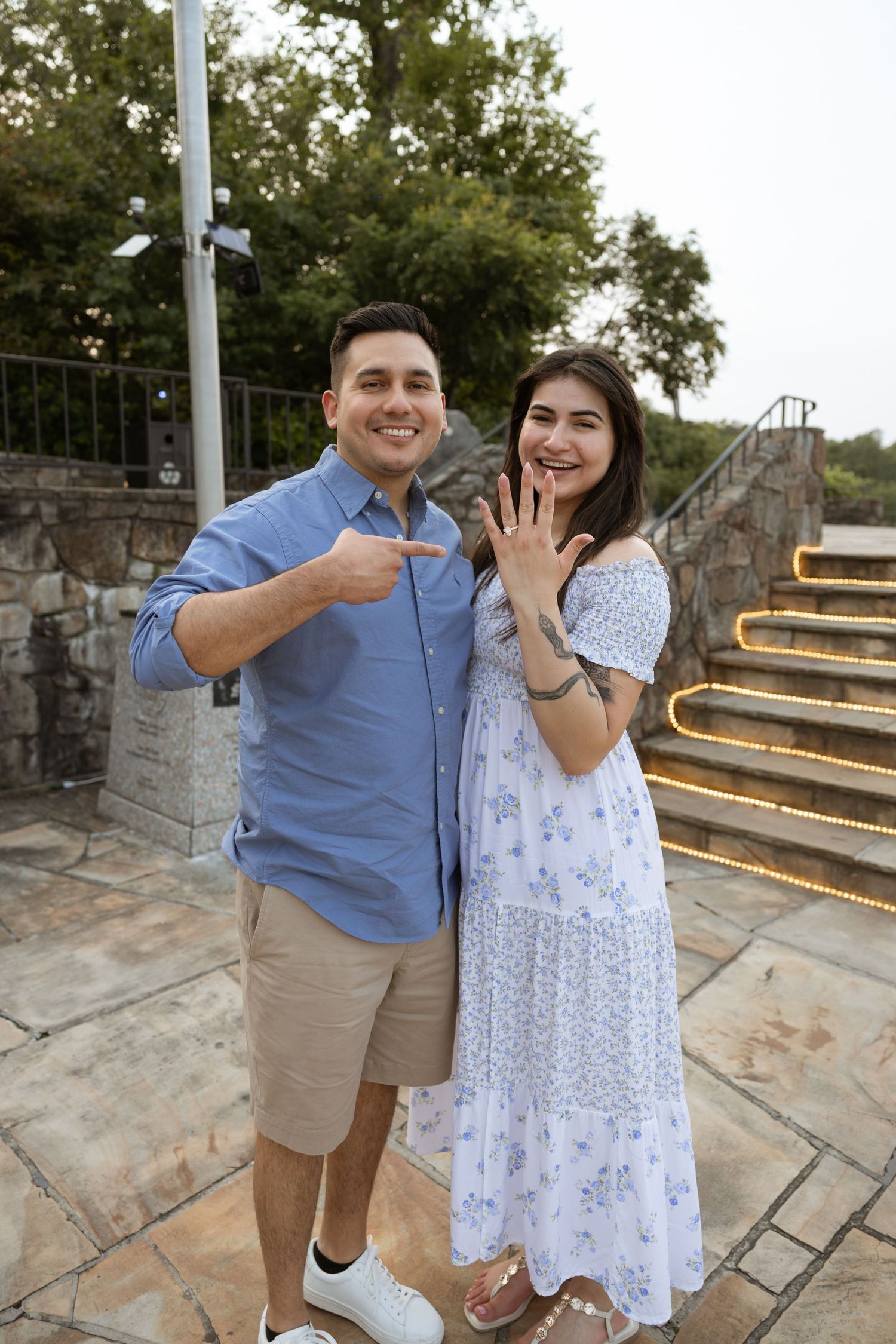 Newly engaged couple embracing at Rock City’s Lover’s Leap in Lookout Mountain GA