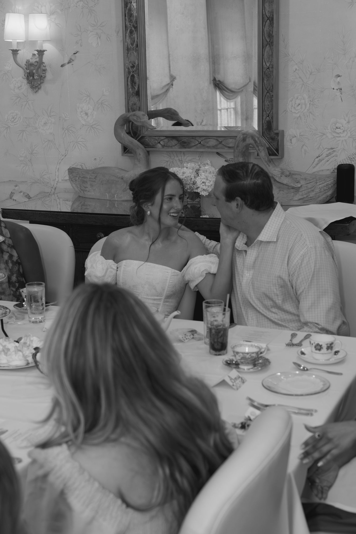 Candid guest interactions at bridal shower in historic Atlanta venue