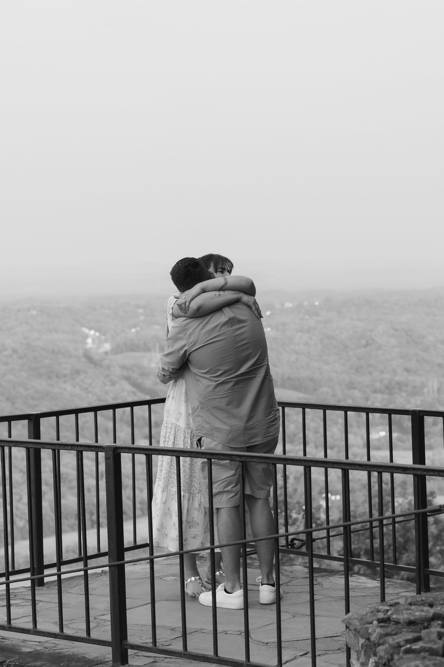 Atlanta engagement photographer capturing surprise proposal at Rock City GA