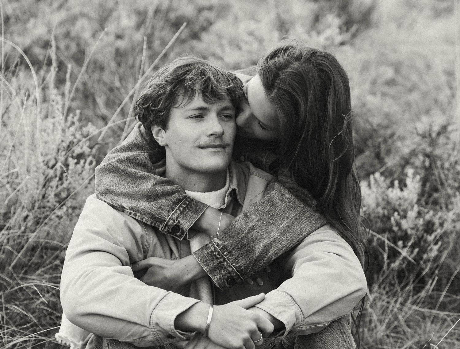 A sweet black and white romantic moment captured in nature.