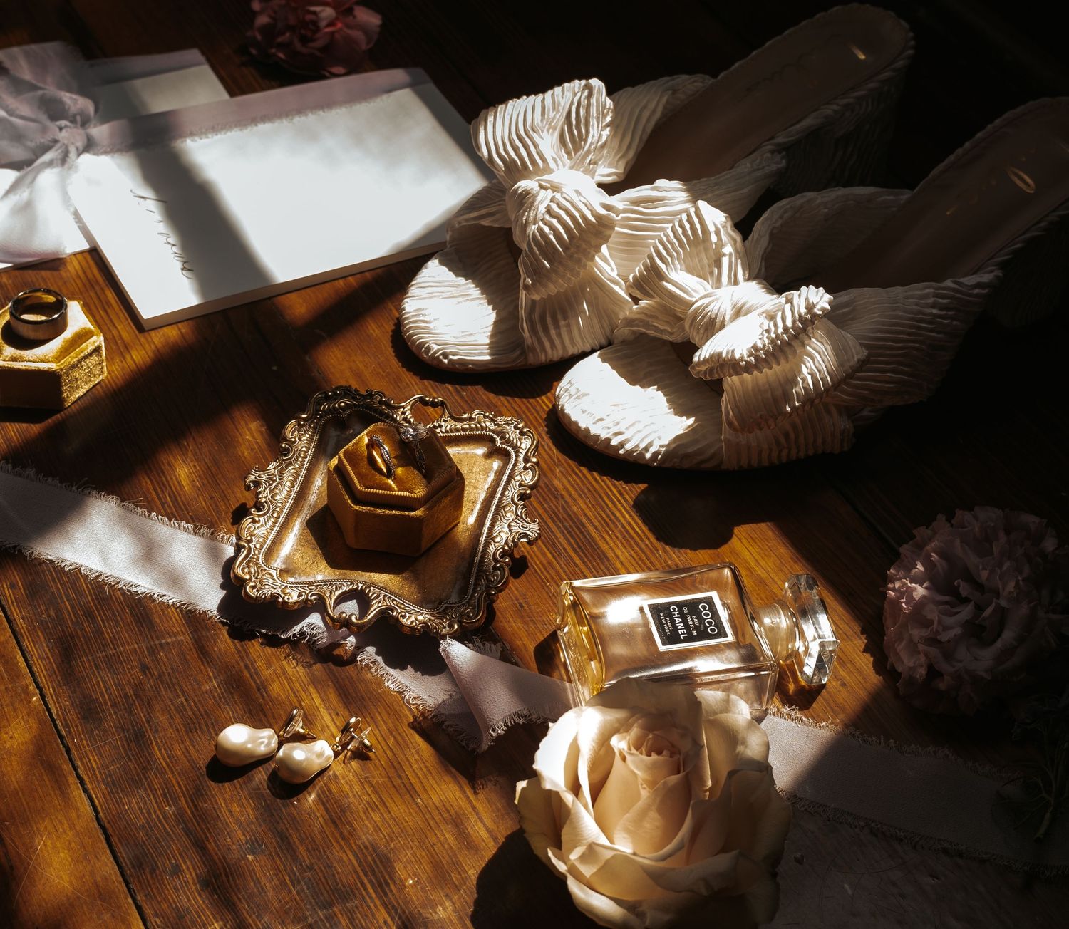 Sunlight casting dramatic shadows on vintage wooden furniture and decor.