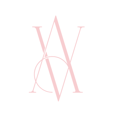 Pink typographic letter designs arranged in a minimalist pattern.