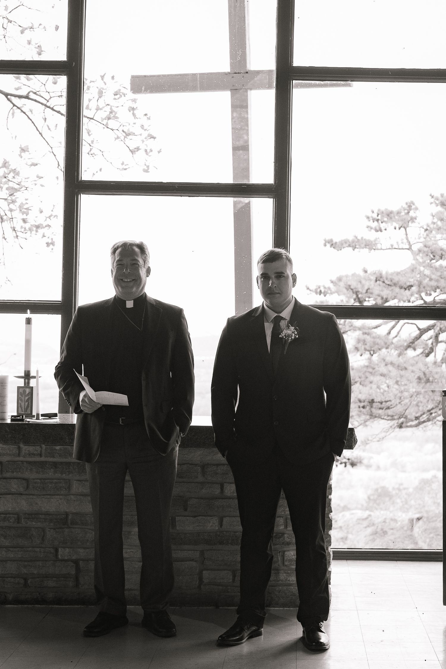 A series of black and white photos showing people in formal attire standing in front of large windows.