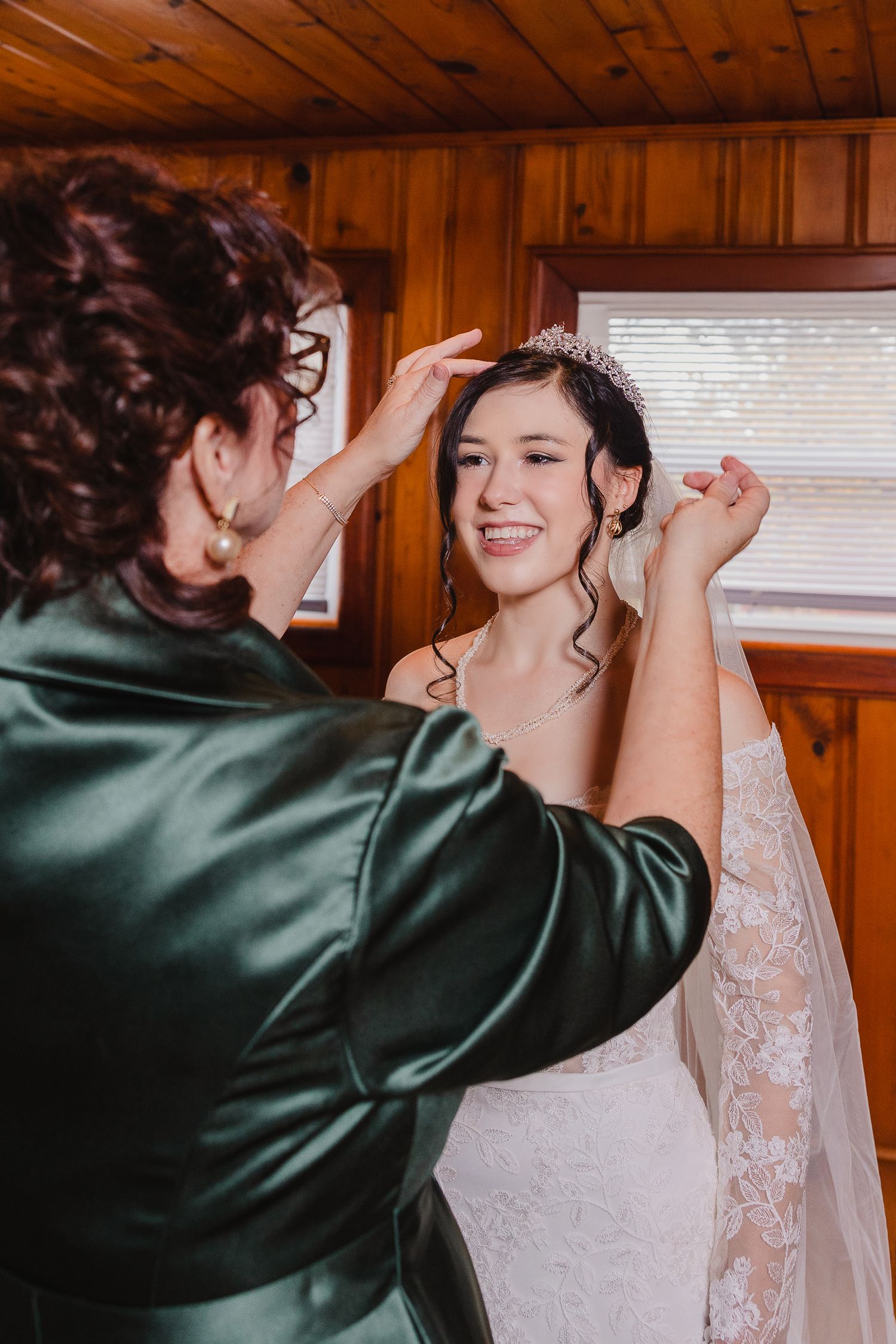 A series of photos showing a bride getting her veil adjusted in a wood-paneled room with natural lighting.