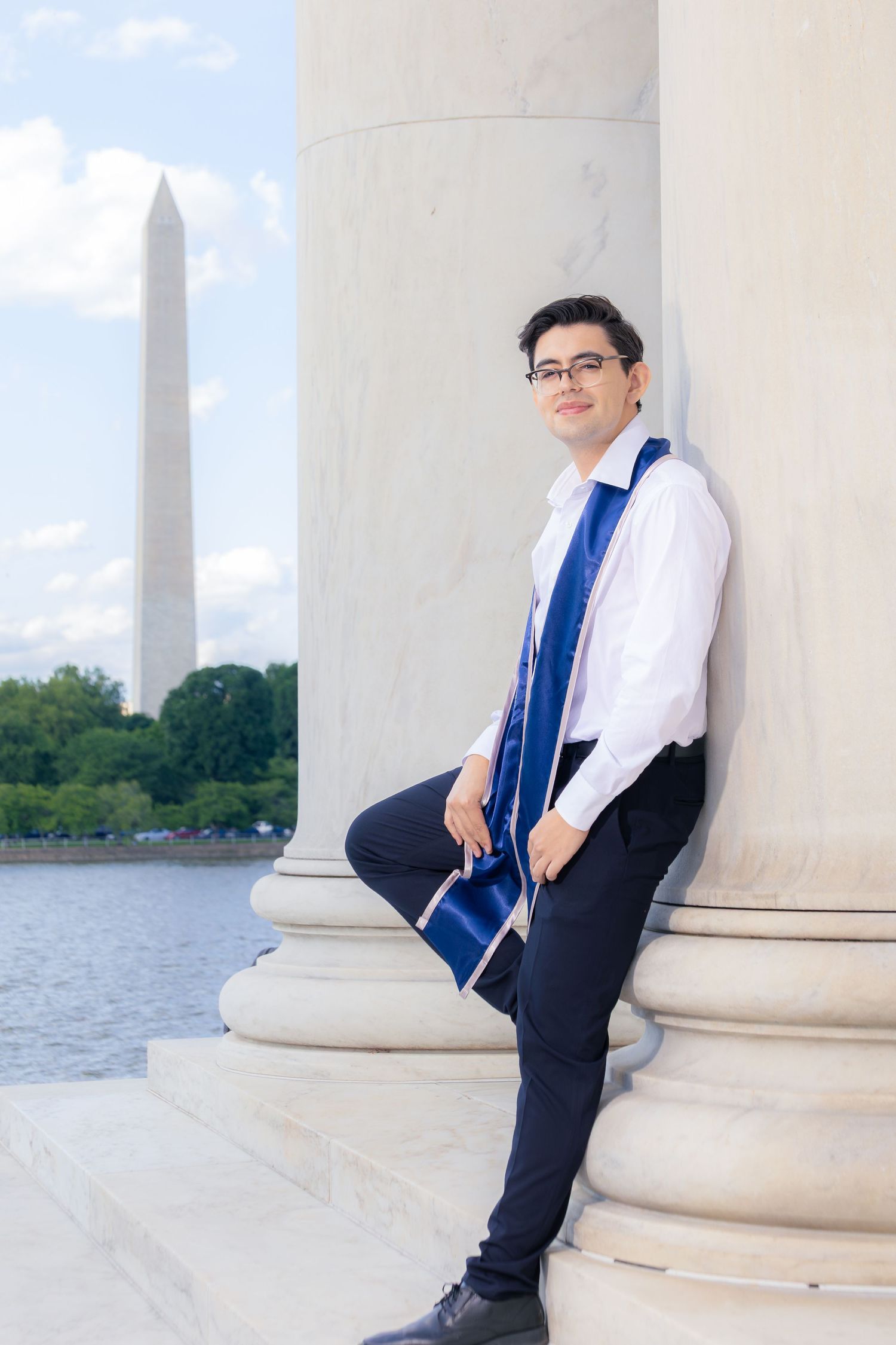 A series of five photographs showing a person posing by white columns with the Washington Monument visible in the distance.