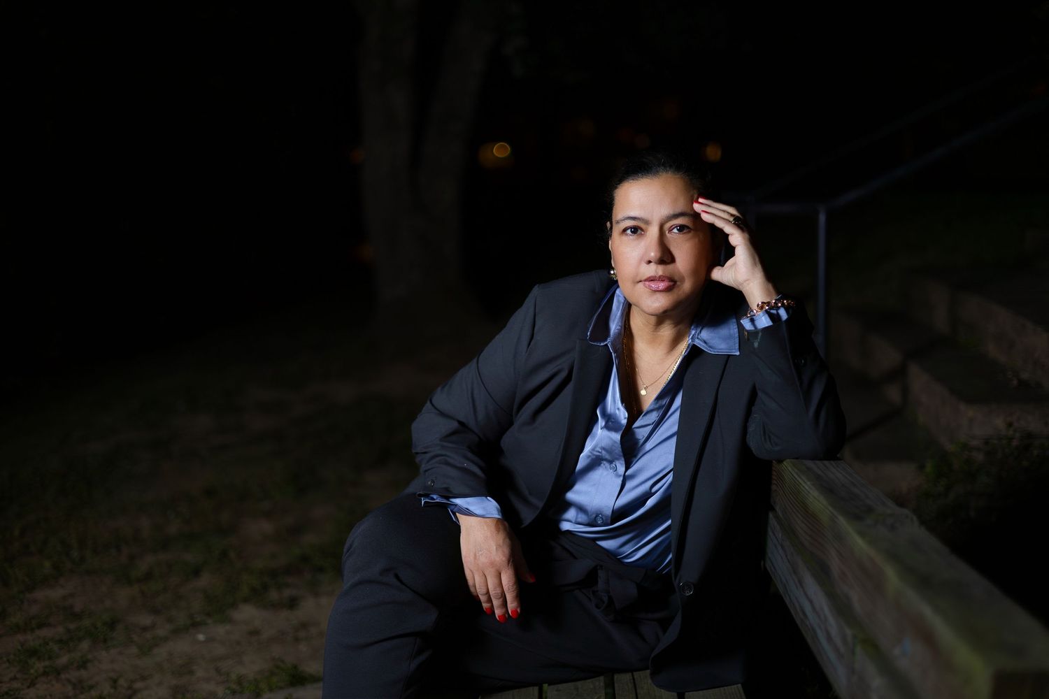 A series of six dark moody portraits showing someone in formal attire against dark backgrounds.