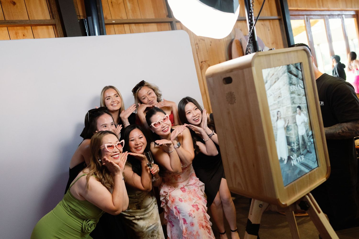 A series of candid party photos showing people laughing and having fun in an indoor setting.