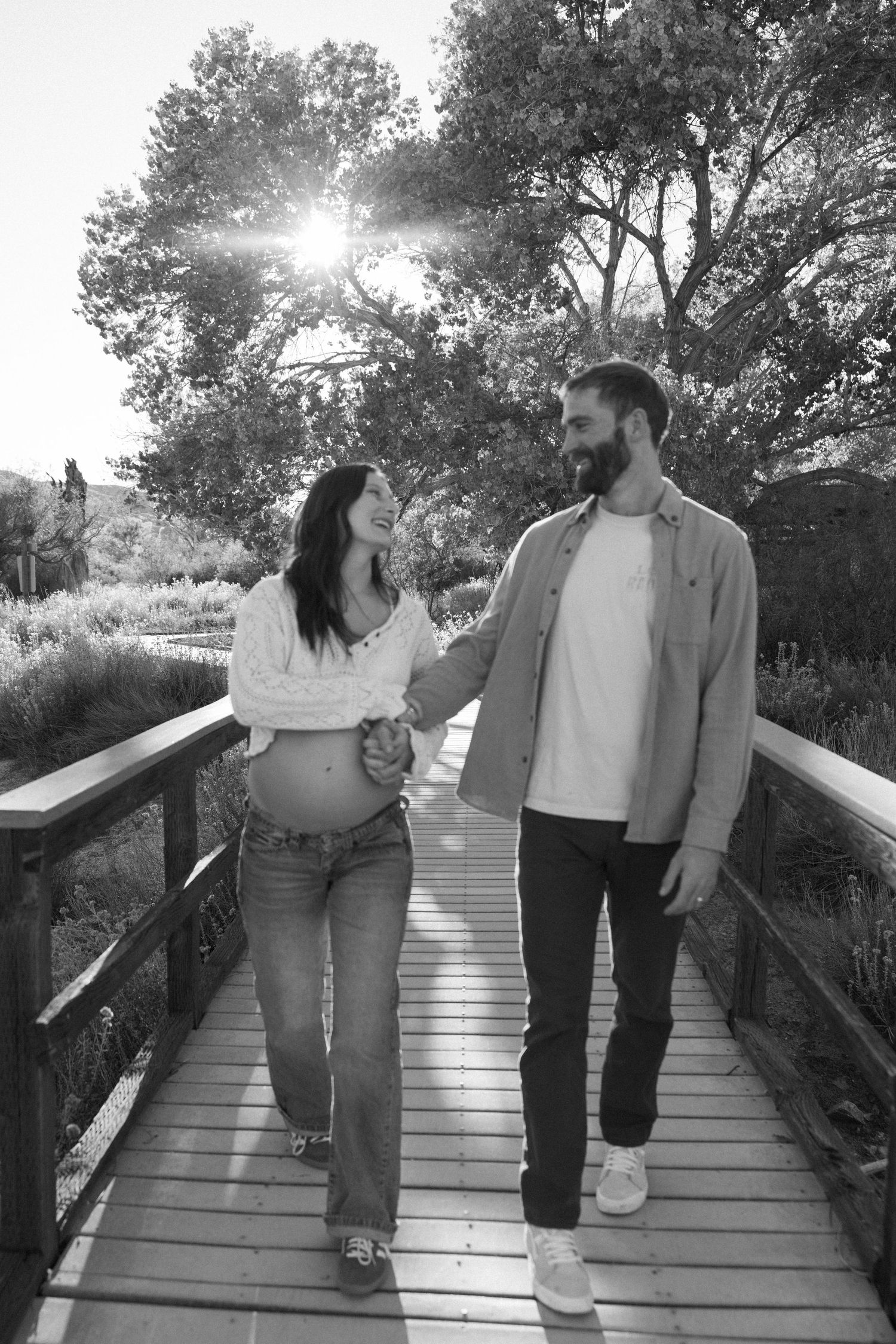 Series of candid walking shots on wooden boardwalk during golden hour.