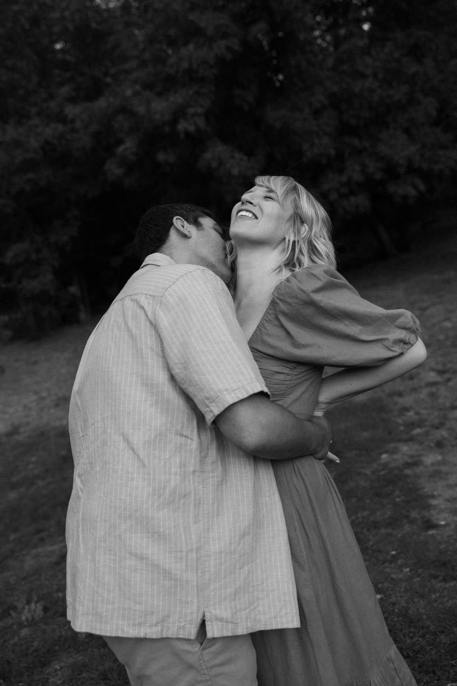 Intimate black and white portrait sequence showing tender embrace.