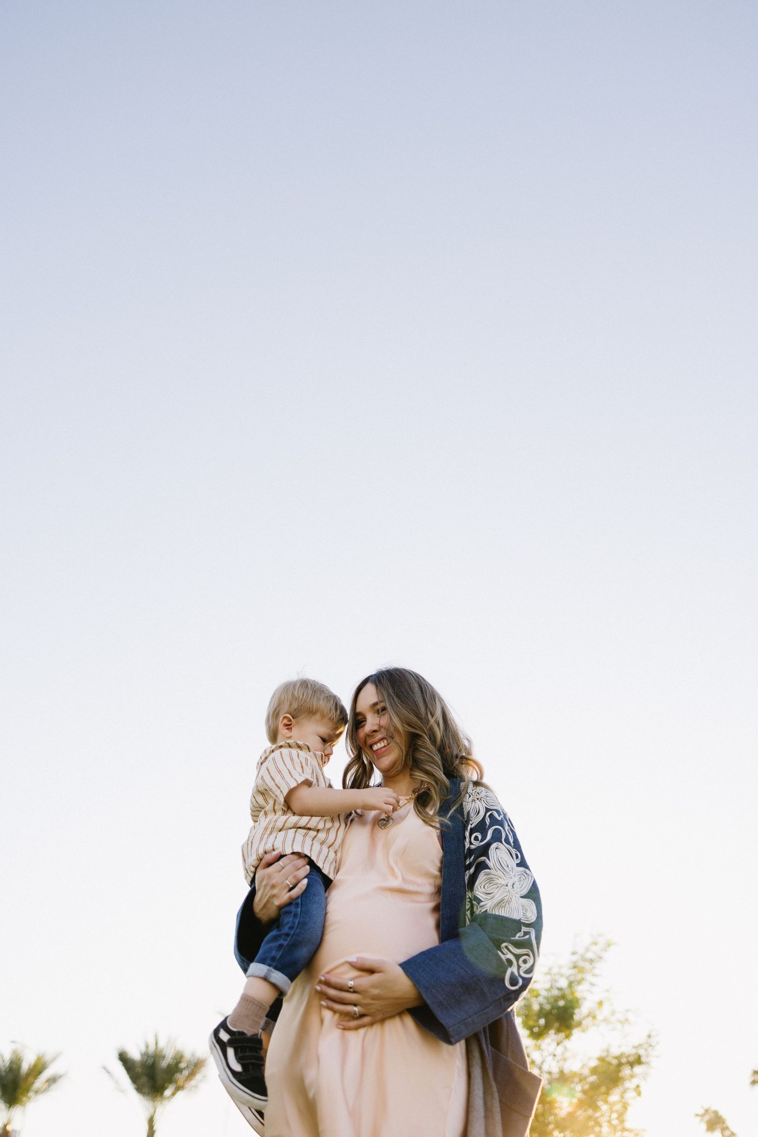 Sweet family portrait session with soft lighting and natural expressions.