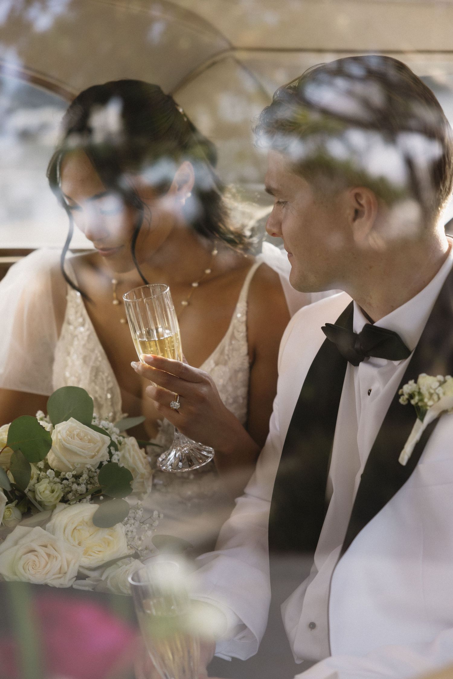 Soft focus sequence of intimate wedding moments with champagne glasses and floral details.