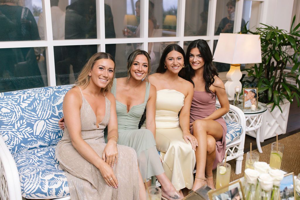 Group celebration at an elegant outdoor venue with formal attire.