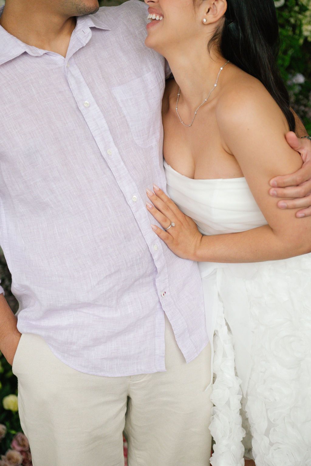 Intimate wedding portraits showing tender moments against a backdrop of climbing roses.