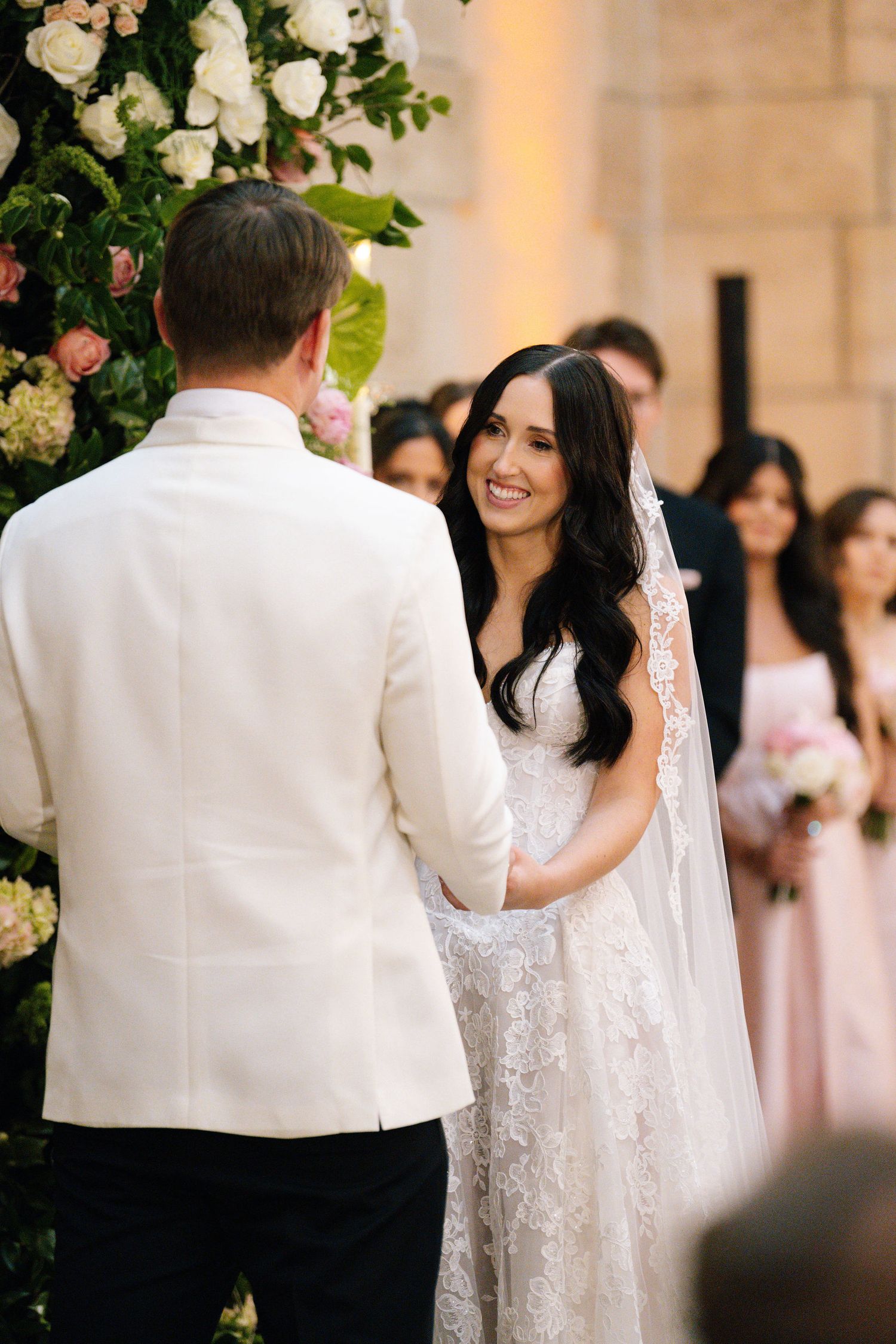 Elegant wedding ceremony moment captured in a beautifully decorated venue.