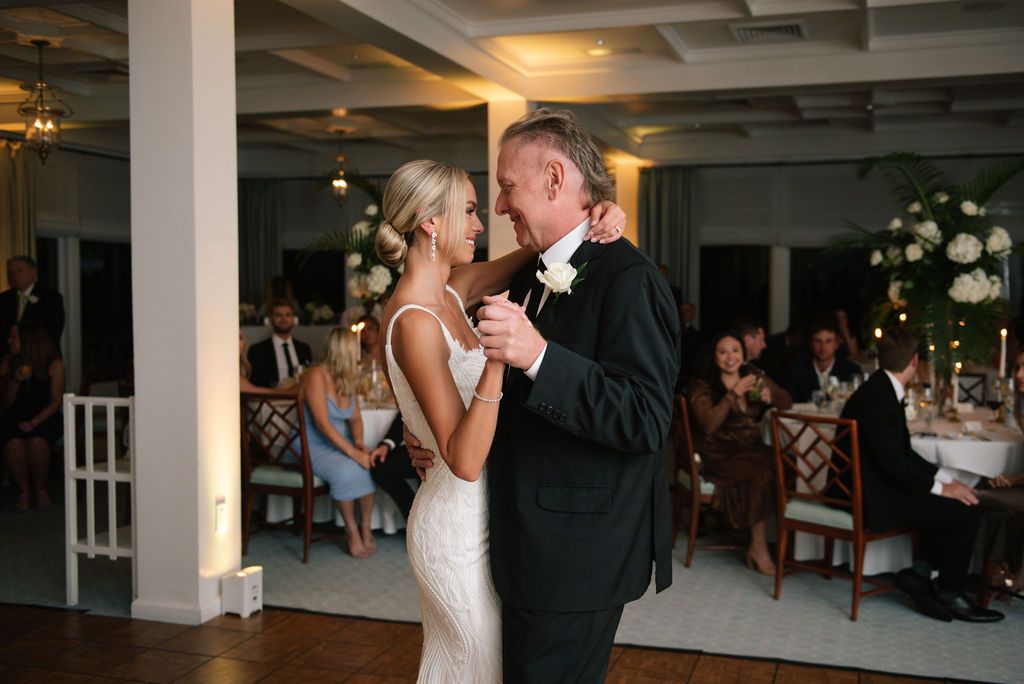 Couple shares an intimate dance moment at their wedding reception.