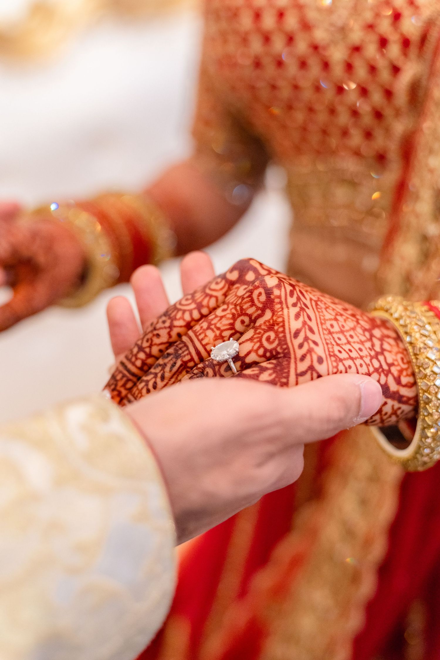 Groom and Bride holding hand in their traditional clothing