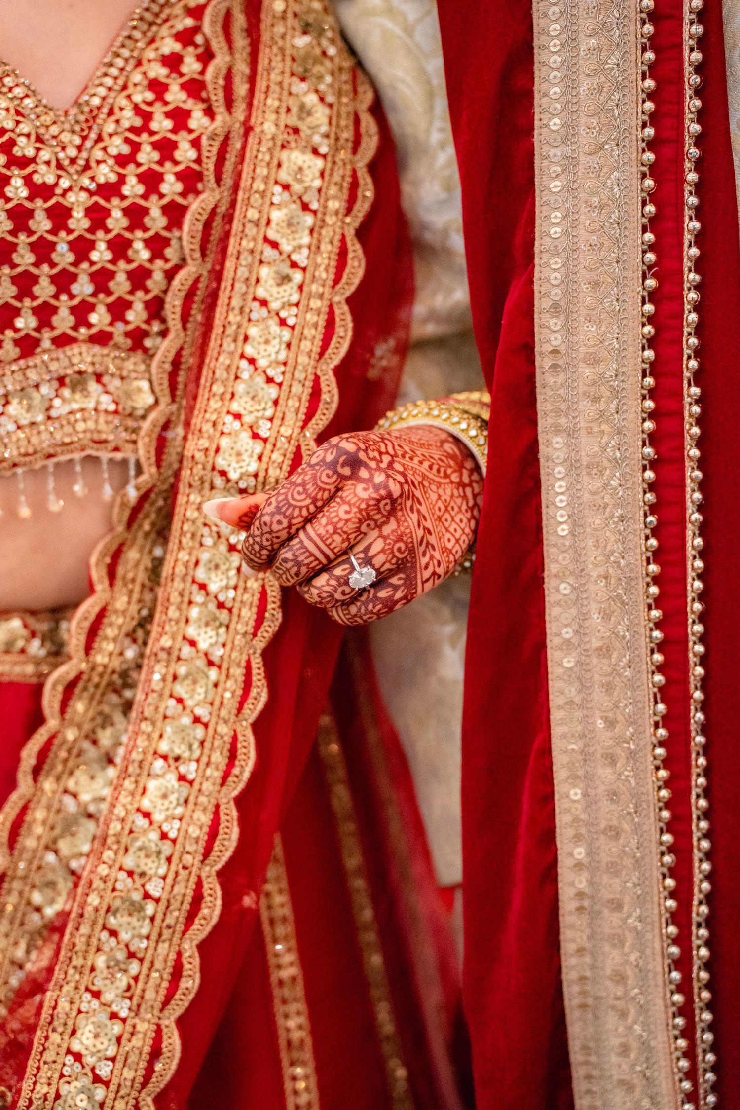 Groom and Bride corss hand in their traditional clothing