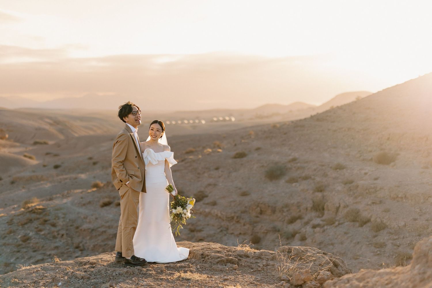 wedding  in the desert of agafay marrakech, editorial bride and groom photoshoot in agafay desert. marrakech wedding photographer